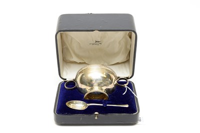 Lot 139 - A silver two handled bowl and spoon cased, by Walker and Hall