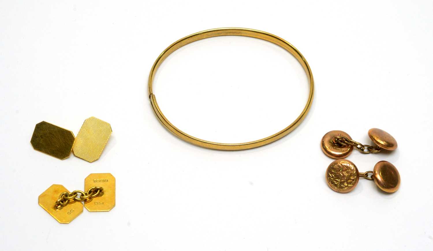 Lot 191 - Two pairs of cufflinks and a bangle