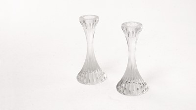 Lot 852 - Baccarat, France: a pair of clear glass fluted candlesticks