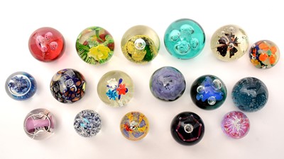 Lot 884 - A collection of 20th Century glass paperweights