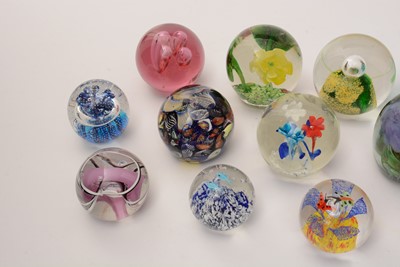 Lot 884 - A collection of 20th Century glass paperweights