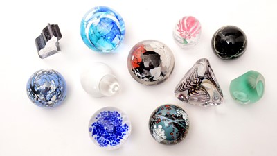 Lot 885 - A collection of 20th Century glass paperweights of known designers