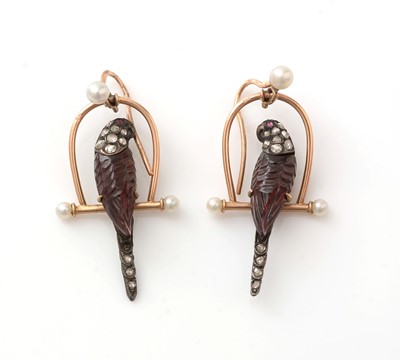 Lot 519 - A fine and unusual pair of Victorian diamond and carved garnet parrot on perch pattern earrings