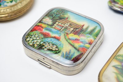 Lot 56 - 1930s powder compacts on the theme of vivid gardens
