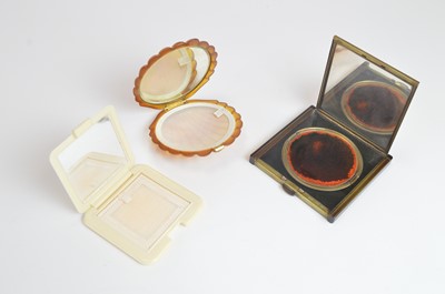 Lot 91 - 1940s lucite and celluloid powder compacts