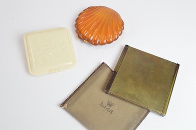 Lot 91 - 1940s lucite and celluloid powder compacts