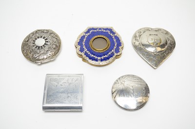 Lot 97 - 1940s Second World War Eastern white metal and base metal compacts