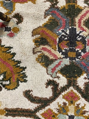 Lot 88 - A large Persian Islamic rug / carpet