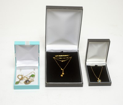 Lot 197 - Pendants and earrings in gold mounts
