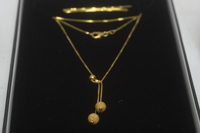 Lot 197 - Pendants and earrings in gold mounts