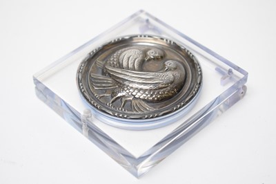 Lot 62 - A late 1930s white metal and lucite powder compact depicting a pair of doves