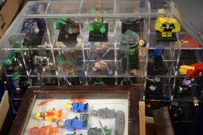 Lot 520 - A large collection of superhero minifigures.