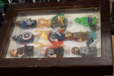 Lot 520 - A large collection of superhero minifigures.