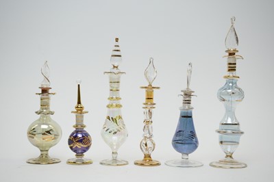 Lot 198 - A collection of Egyptian hand-blown glass perfume bottles
