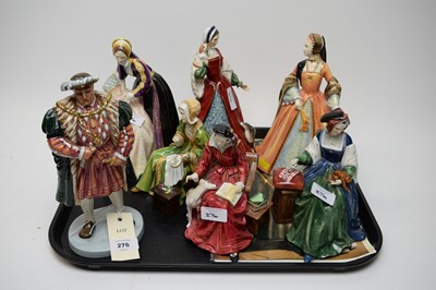 Lot 276 - Royal Doulton figures of Henry VIII and his wives; and a Collectors' Showcase magazine.