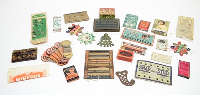 Lot 247 - Antique advertising sewing needles, threads, and stitch counters