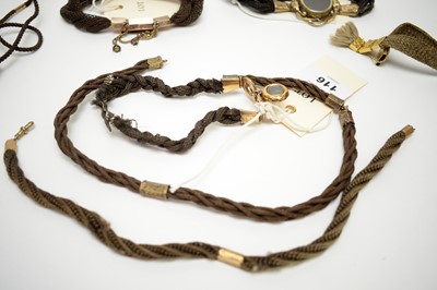 Lot 116 - A collection of 19th Century plaited hair bracelets and necklaces
