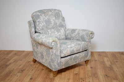 Lot 58 - Duresta two-seater sofa and chair upholstered in pale blue floral woven cotton.
