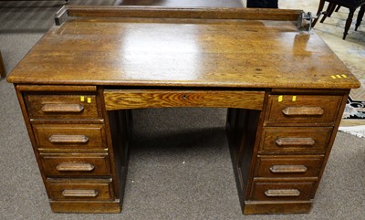 Lot 34a - A retro vintage early/mid 20th Century oak writing desk