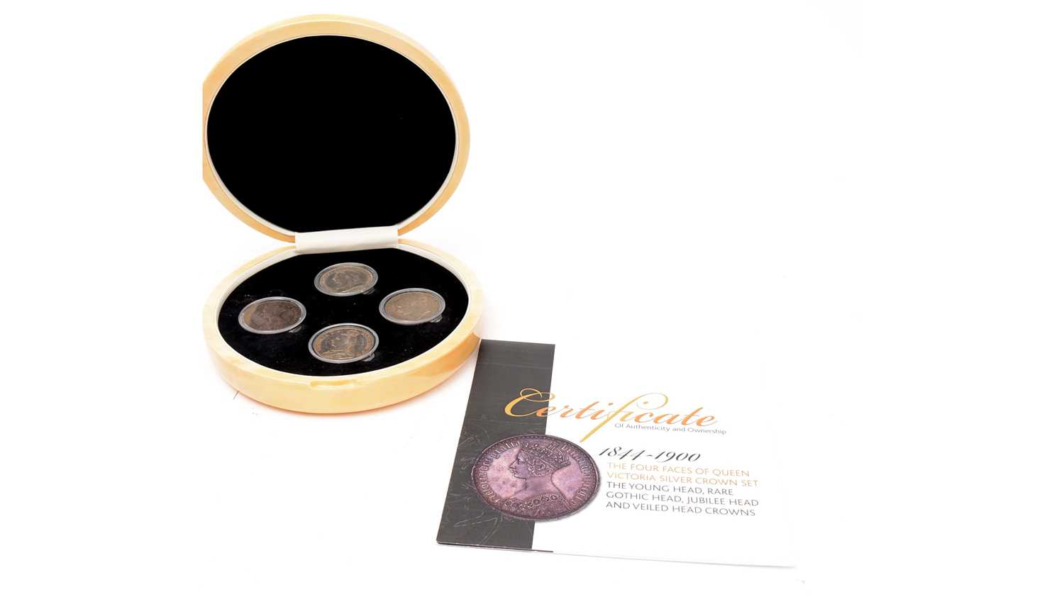 553 - The Four Faces of Queen Victoria silver crown set,