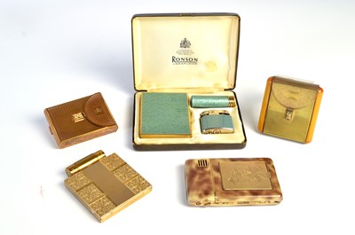 Lot 111 - 1940s combination vanity cases, and a Ronson vanity set