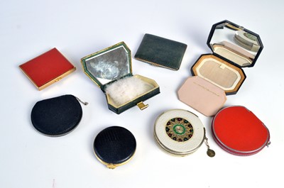 Lot 114 - 1940s leather and similar loose powder compacts