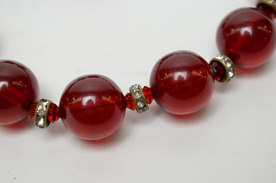 Lot 19 - A 1930s Art Deco cherry-red lucite demi-parure