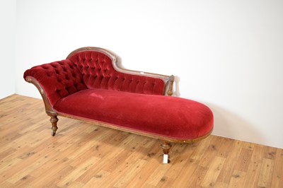 Lot 17 - A late 19th century chaise longue upholstered in red velvet fabric