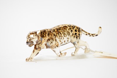 Lot 399 - A Swarovski Crystal figure of a jaguar.