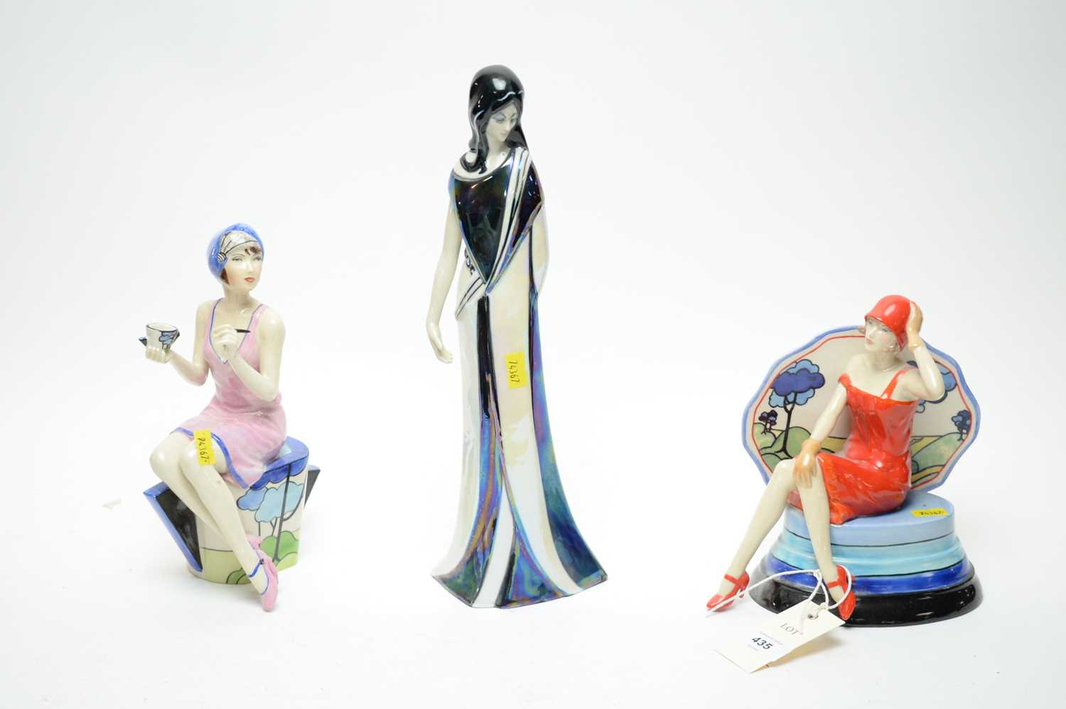 Lot 435 - Two Art Deco figures; and another.