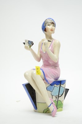 Lot 435 - Two Art Deco figures; and another.