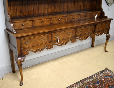 Lot 78 - A large and impressive 18th Century style oak Welsh dresser.