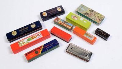Lot 31 - Eleven assorted harmonicas