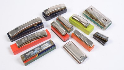 Lot 31 - Eleven assorted harmonicas