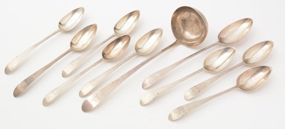 Lot 161 - A George III Irish silver basting spoon; eight Irish silver tablespoons and Irish silver soup ladle