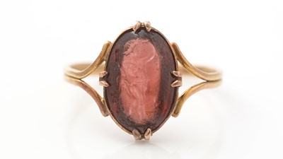 Lot 520 - A 19th Century Grand Tour carved garnet intaglio ring