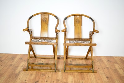 Lot 3 - A pair of Chinese hardwood and metal mounted folding hunting chairs