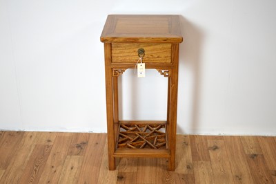 Lot 19 - A 20th Century Chinese oriental hardwood pedestal table.
