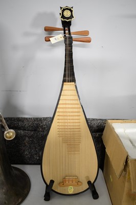 Lot 387 - A Chinese lute, with stand, in box.