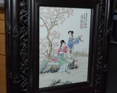 Lot 858 - A set of four Chinese oriental decorative ebonised hardwood and porcelain panels