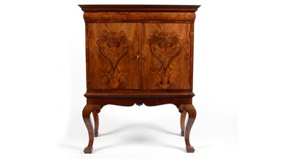 Lot 1306 - A burr walnut cabinet on stand