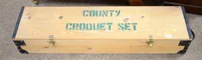 Lot 549 - A pine cased County Croquet Set.