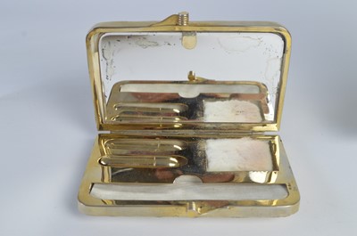 Lot 73 - 1930s and later compacts, including a novelty powder compact bracelet