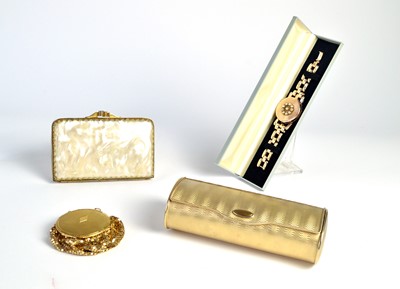 Lot 73 - 1930s and later compacts, including a novelty powder compact bracelet