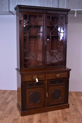 Lot 39 - An early 20th Century mahogany carved and glazed bookcase