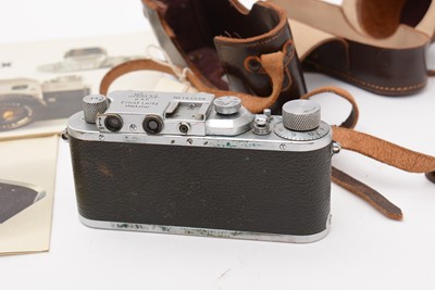 Lot 397 - A Leica IIIa rangefinder camera; and accessories