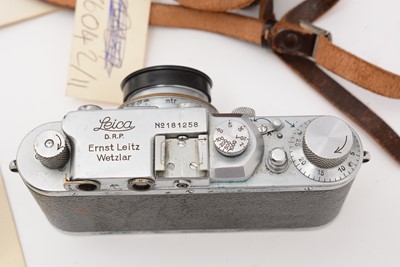 Lot 169 - A Leica IIIa rangefinder camera; and accessories