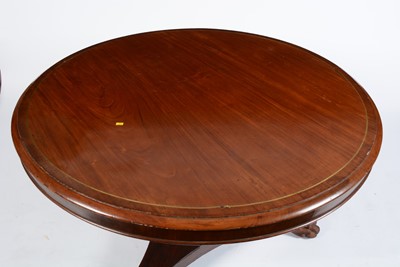 Lot 1327 - A Victorian mahogany and brass inlaid tilt-action dining table