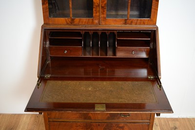 Lot 18 - An early 20th Century mahogany bureau bookcase by Harrods of London