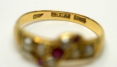 Lot 208 - A ruby, diamond, and pearl ring